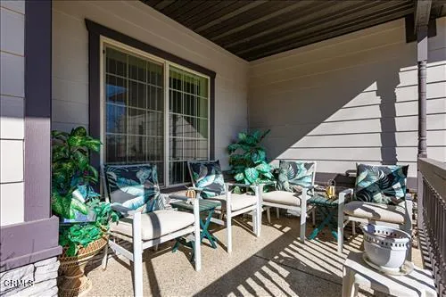 a view of balcony with chairs