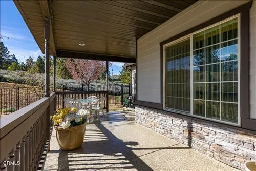 a view of a porch with furniture
