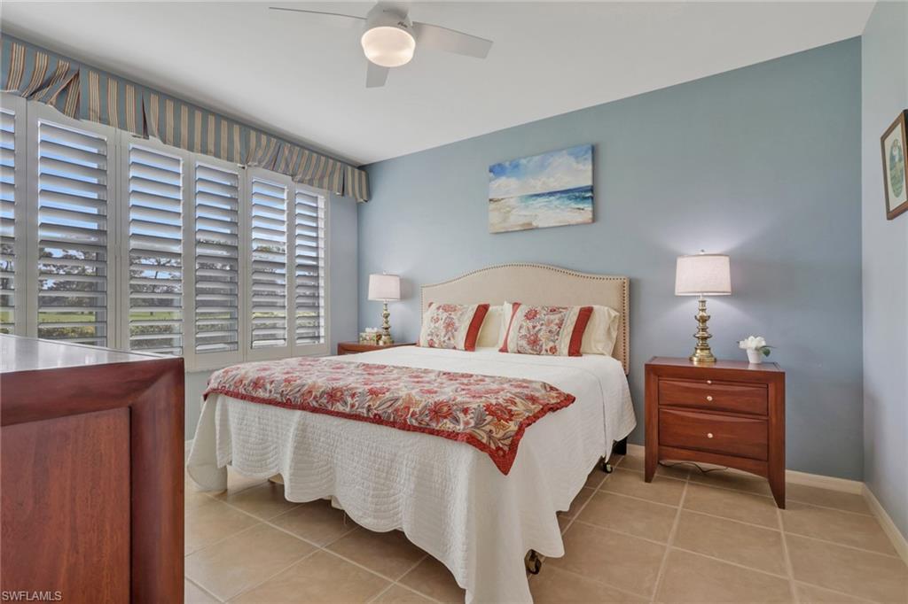 9281 Spring Run Boulevard, Unit 2607 Estero, FL 34135 - Photo 17 of 32 a bedroom with a bed and a window
