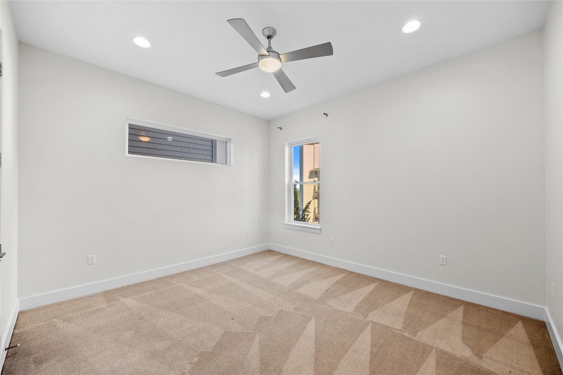 4300 Mansfield Dam Road, Unit 621 Austin, TX 78734 - Photo 12 of 34 an empty room with a window and a ceiling fan