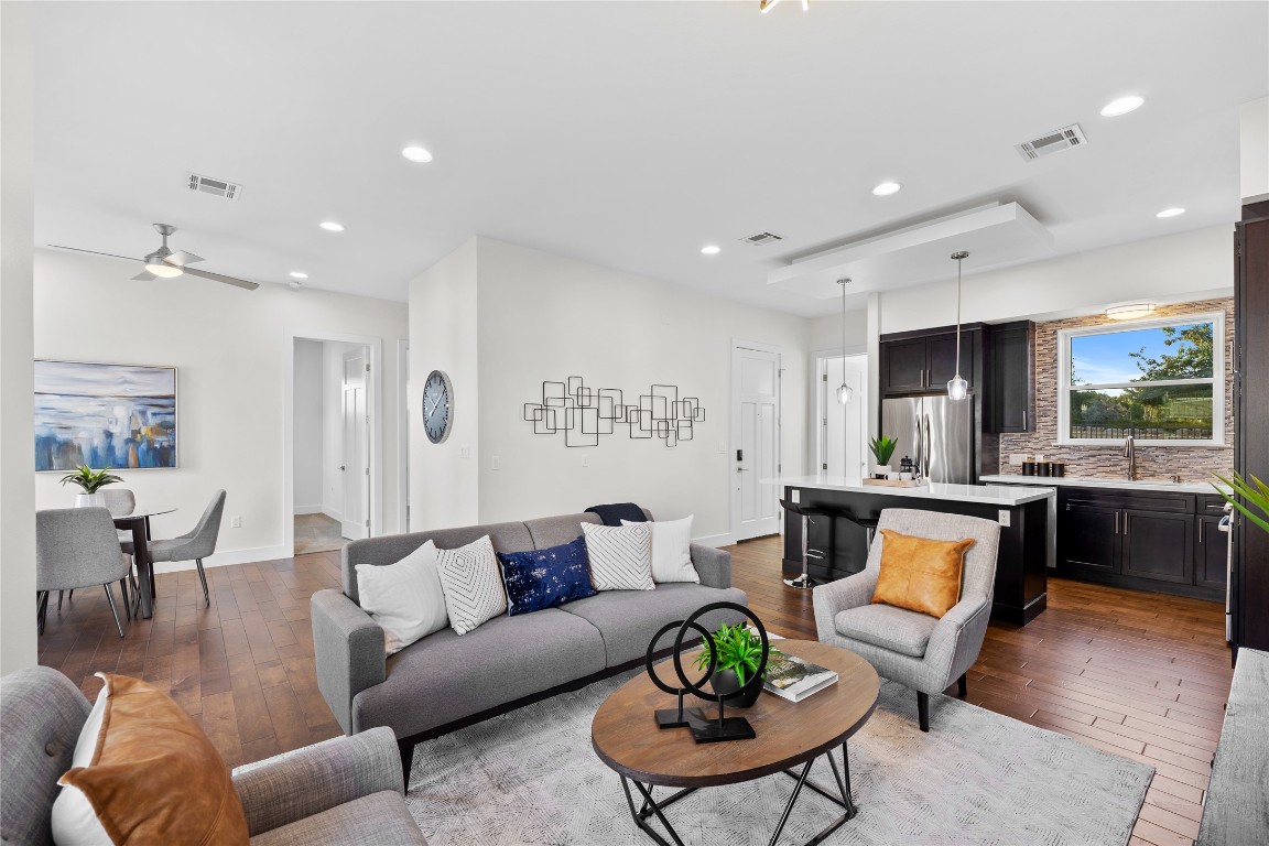 4300 Mansfield Dam Road, Unit 621 Austin, TX 78734 - Photo 9 of 34 a living room with furniture kitchen view and a large window