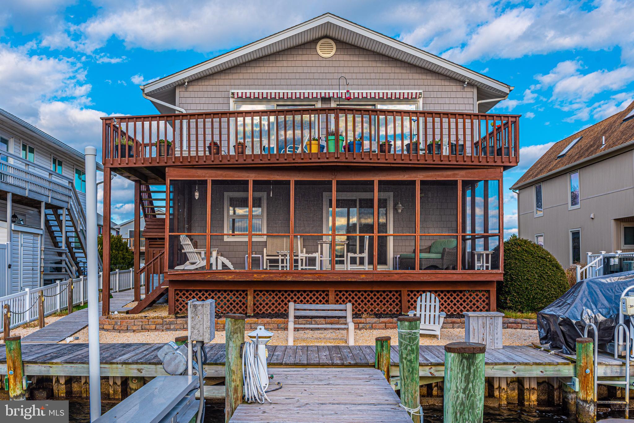 705 South Surf Road Ocean City, MD 21842 - Photo 19 of 98 Screened in porch & 2nd level deck