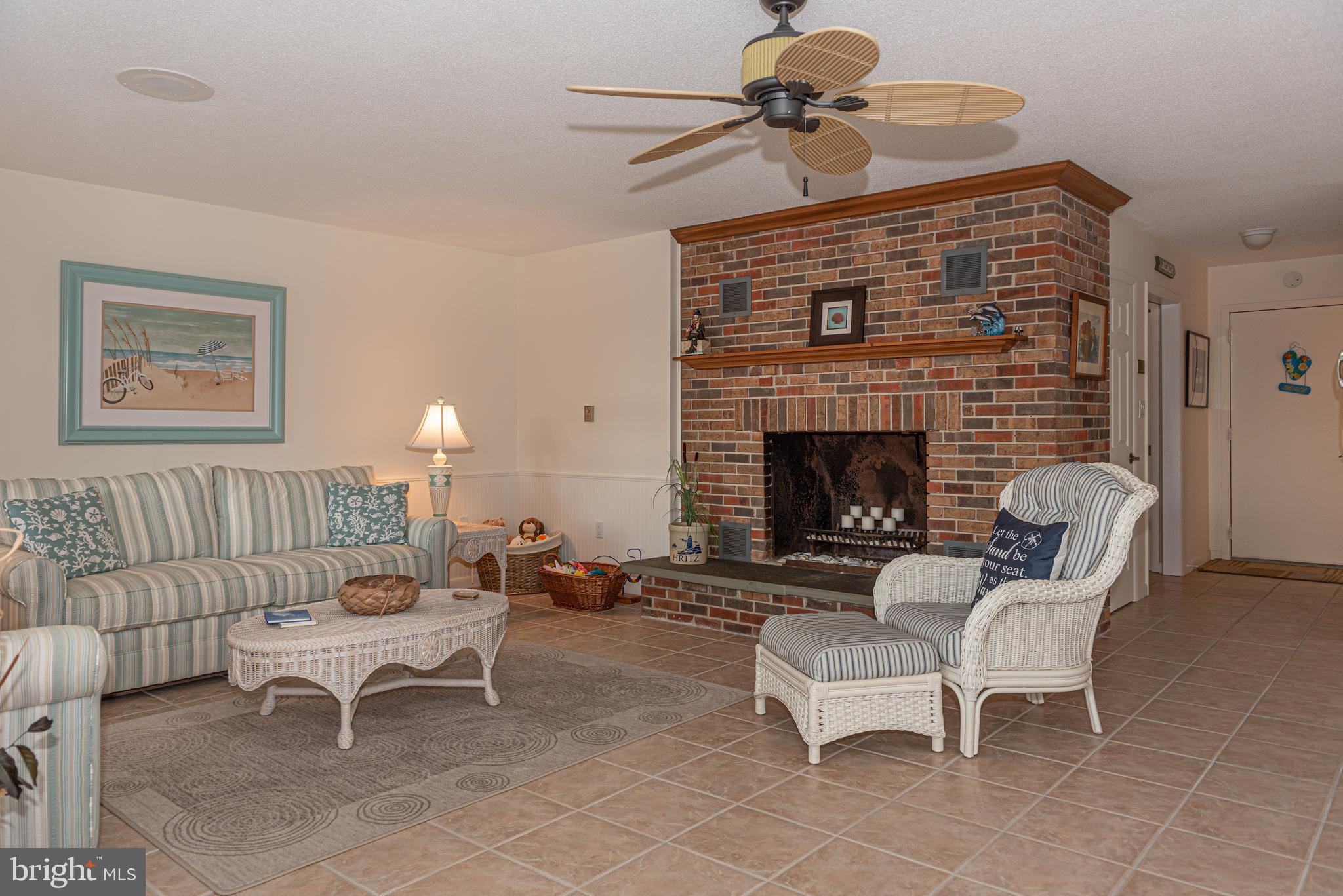 705 South Surf Road Ocean City, MD 21842 - Photo 75 of 98 LR area WALKOUT level, wood burning fireplace
