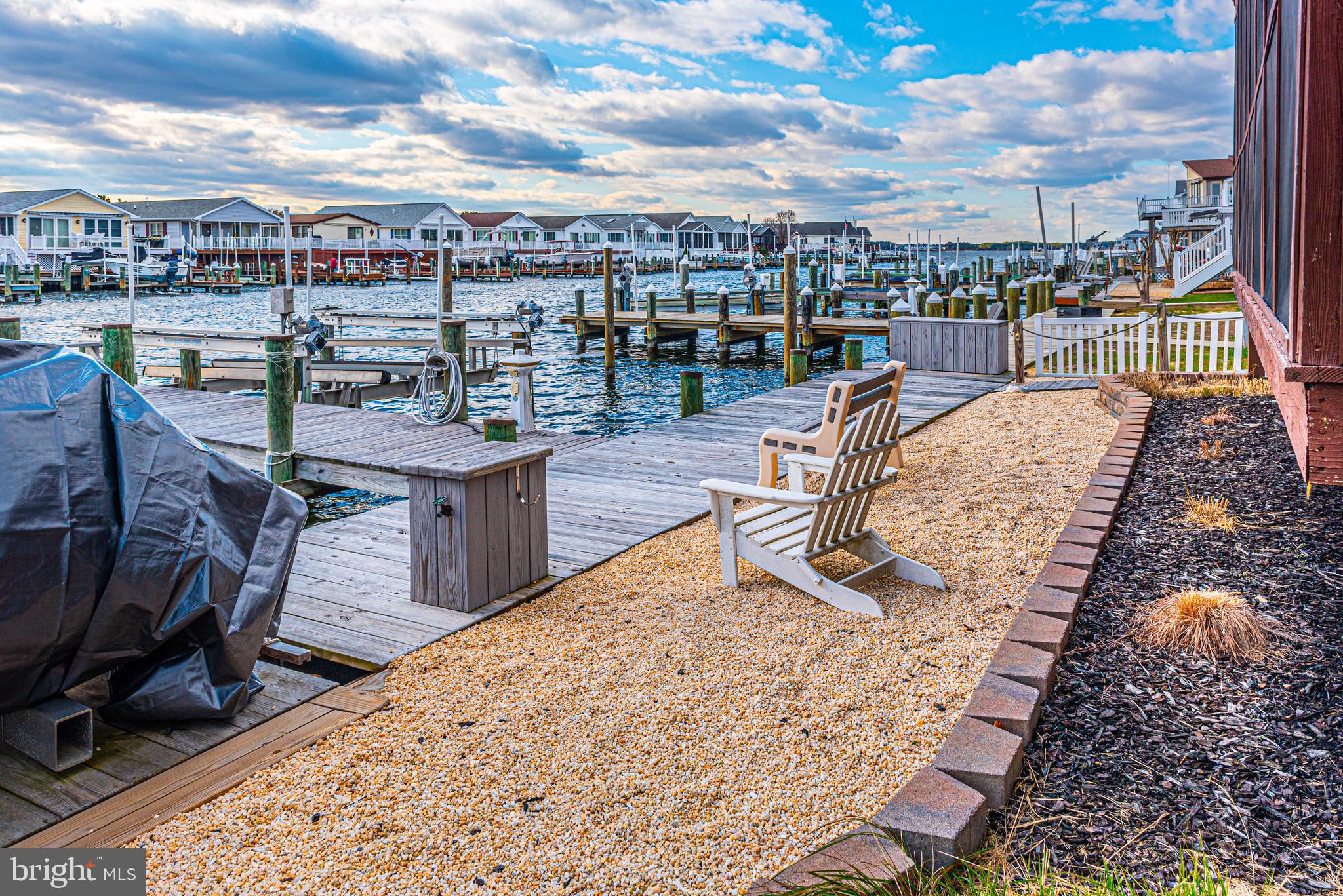 705 South Surf Road Ocean City, MD 21842 - Photo 85 of 98 Jet ski hoist to the left/covered