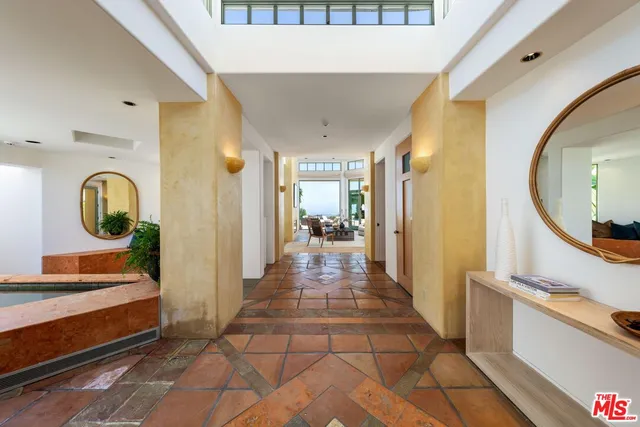 a kitchen with stainless steel appliances a stove a sink dishwasher and cabinets
