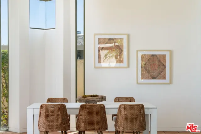 a spacious bathroom with a granite countertop sink mirror and a