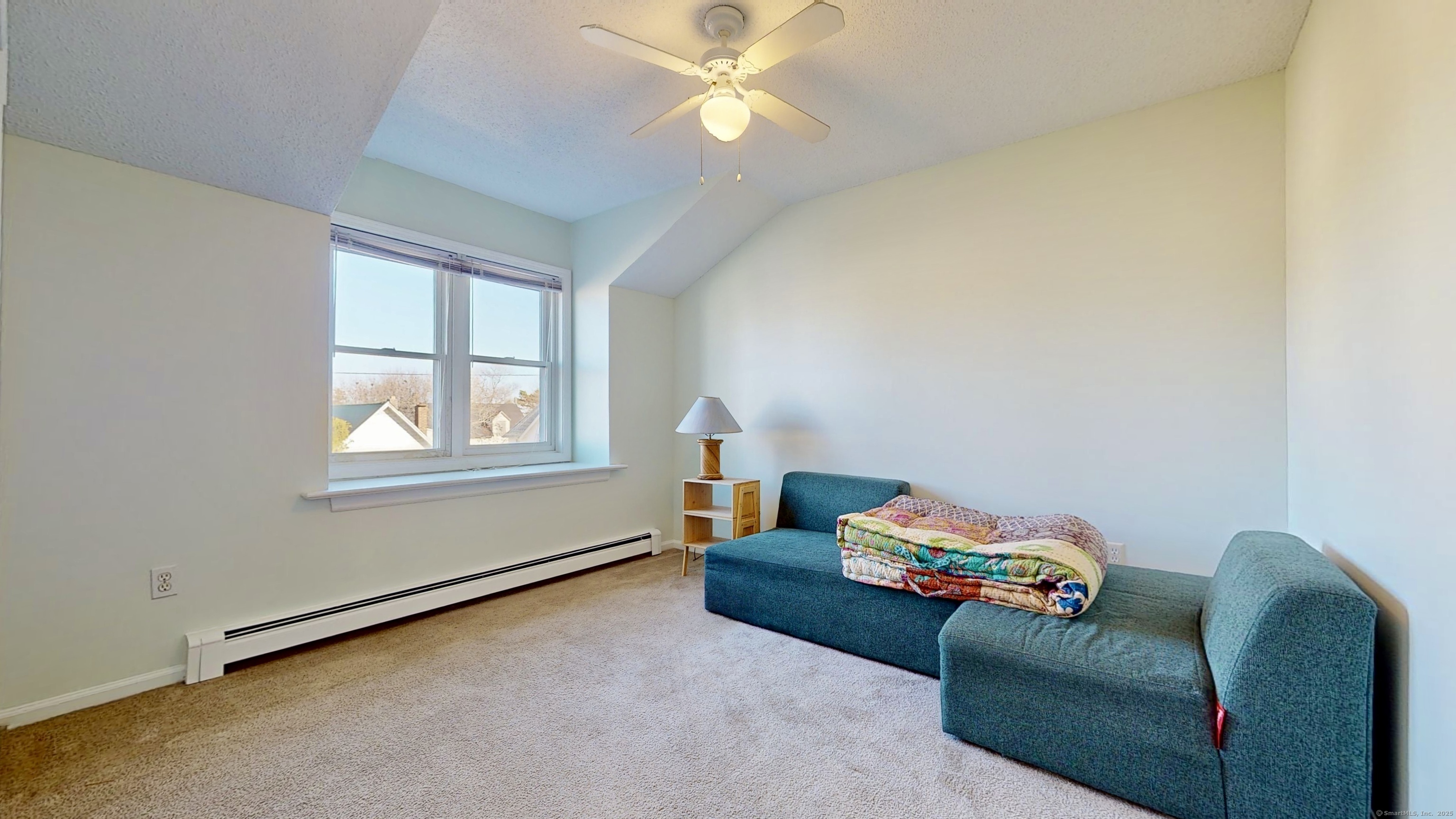 23 Village Road, Unit 23 Milford, CT 06460 - Photo 11 of 16 a living room with furniture and a window