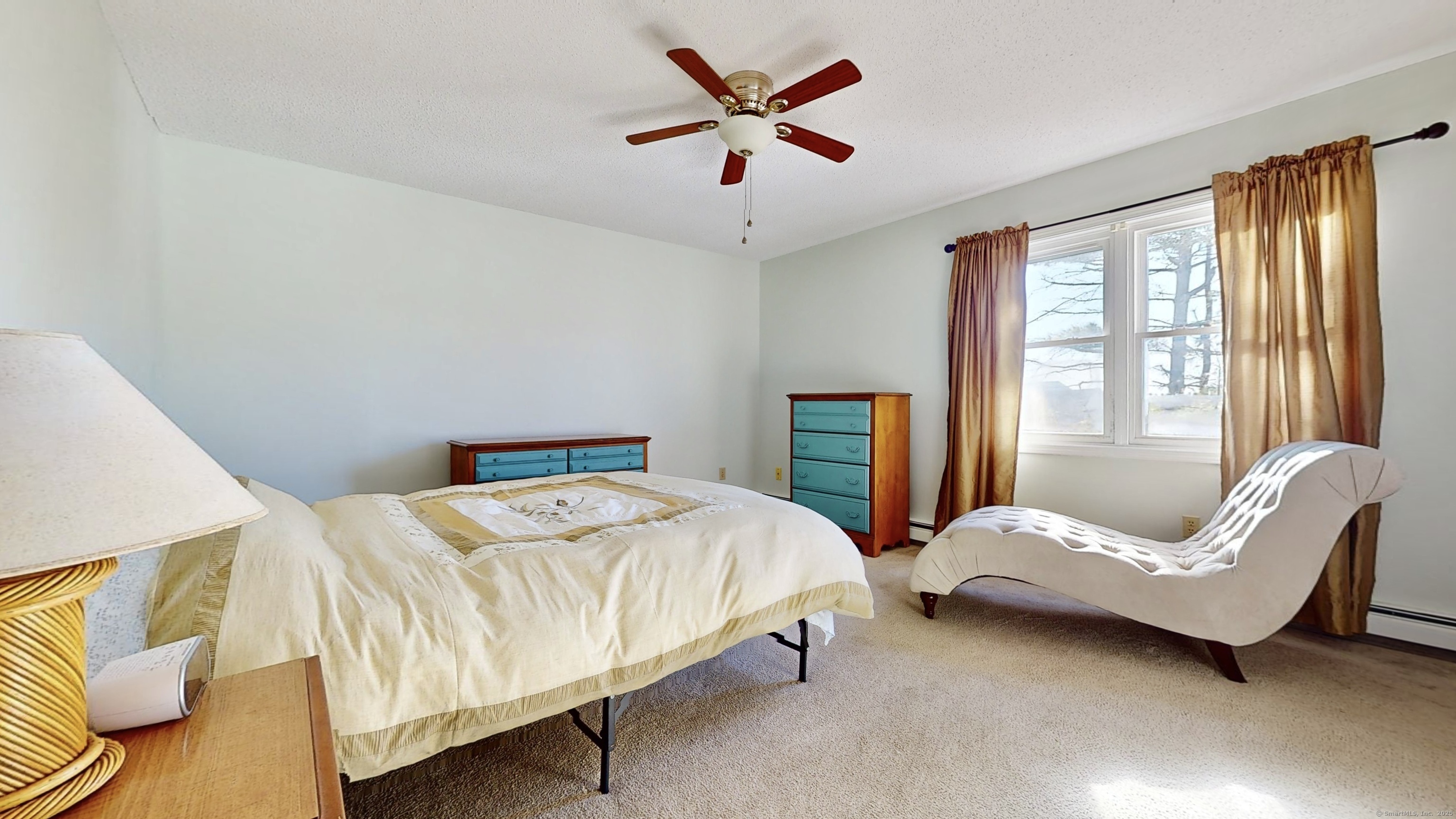 23 Village Road, Unit 23 Milford, CT 06460 - Photo 9 of 16 a bedroom with a bed and a couch