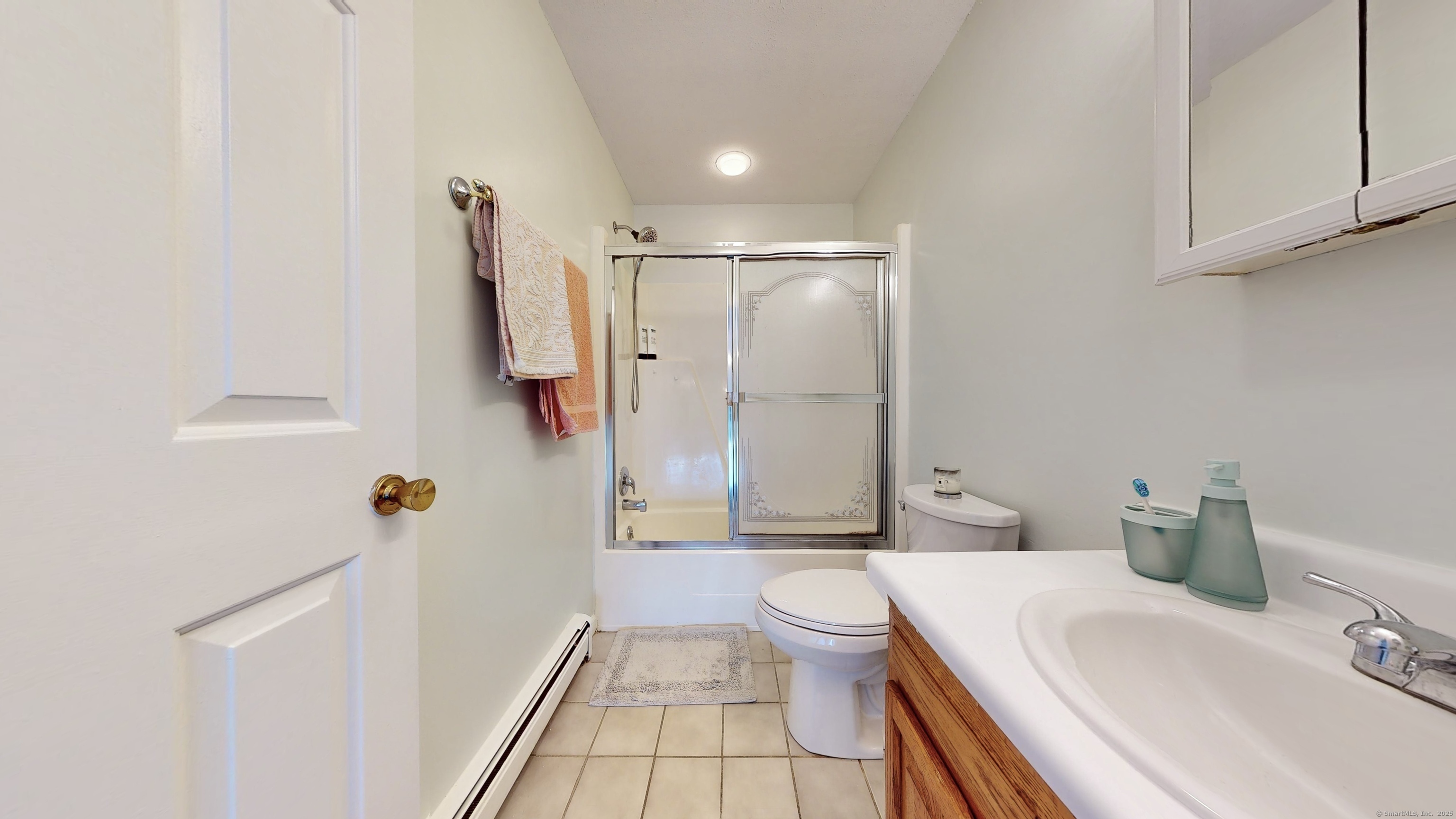 23 Village Road, Unit 23 Milford, CT 06460 - Photo 10 of 16 a bathroom with a sink toilet and shower