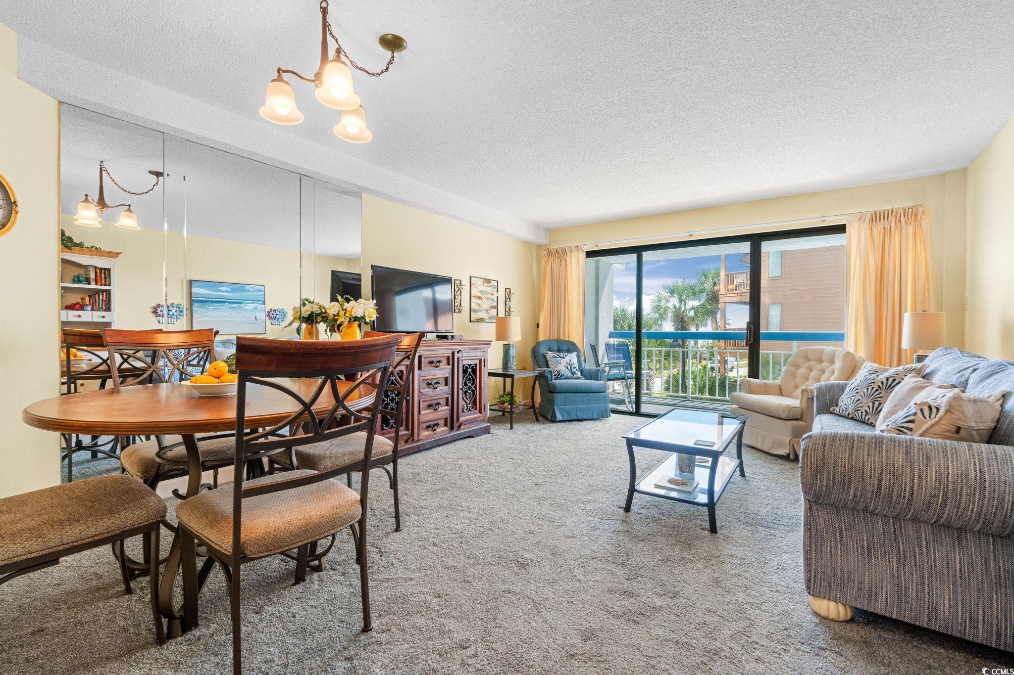 5511 North Ocean Boulevard, Unit 208 Myrtle Beach, SC 29577 - Photo 35 of 37 Sitting room featuring carpet flooring