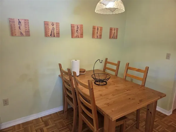 a view of a dining room with furniture