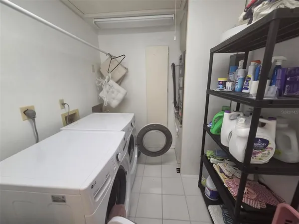 a bathroom with a toilet and a sink