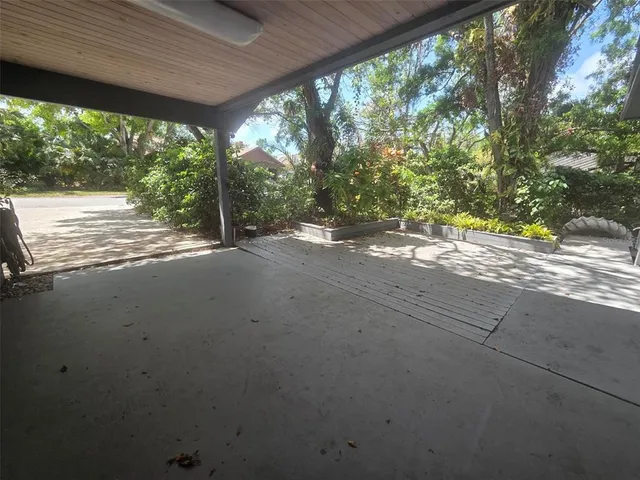 a view of a house with a yard and from a ceiling window