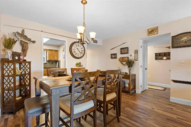 a kitchen with stainless steel appliances granite countertop a refrigerator stove and microwave