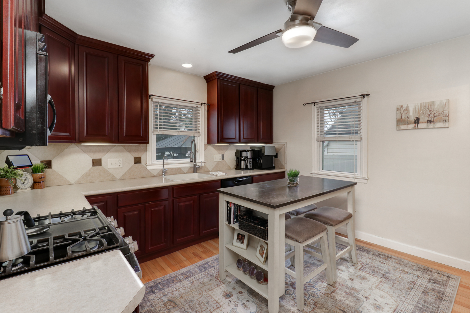 4 University Court Normal, IL 61761 - Photo 14 of 54 a kitchen with stainless steel appliances a sink stove and cabinets