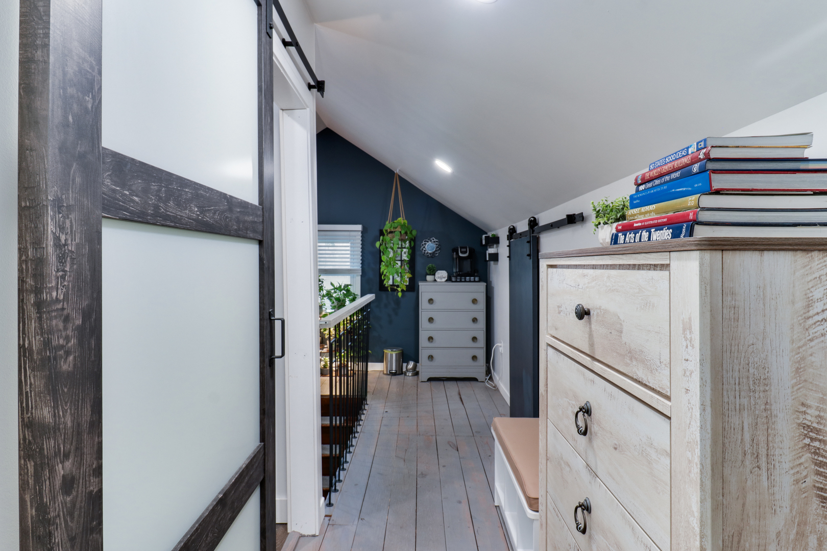 4 University Court Normal, IL 61761 - Photo 27 of 54 a hallway with cabinets and wooden floor