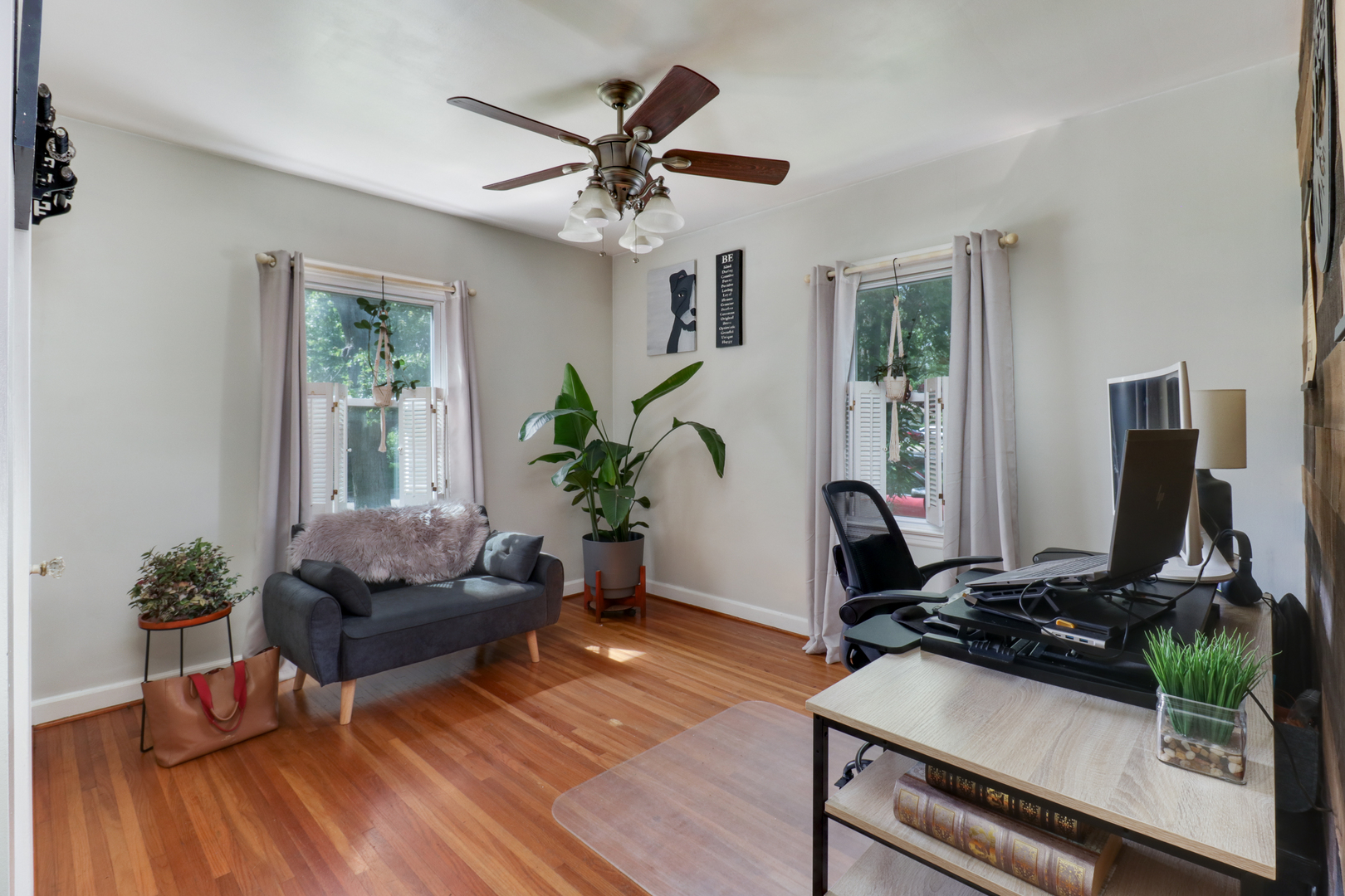 4 University Court Normal, IL 61761 - Photo 28 of 54 a living room with furniture gym equipment and a flat screen tv