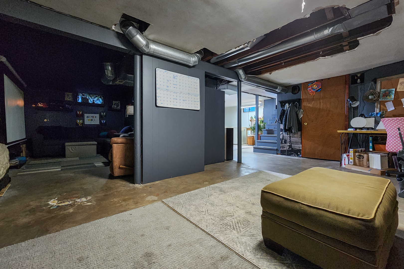 4 University Court Normal, IL 61761 - Photo 36 of 54 a living room with furniture and a rug