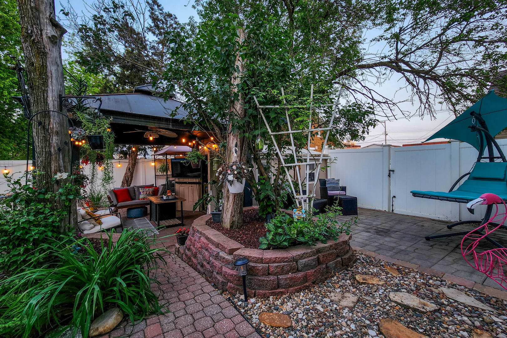 4 University Court Normal, IL 61761 - Photo 44 of 54 a view of a chair and table in backyard of the house