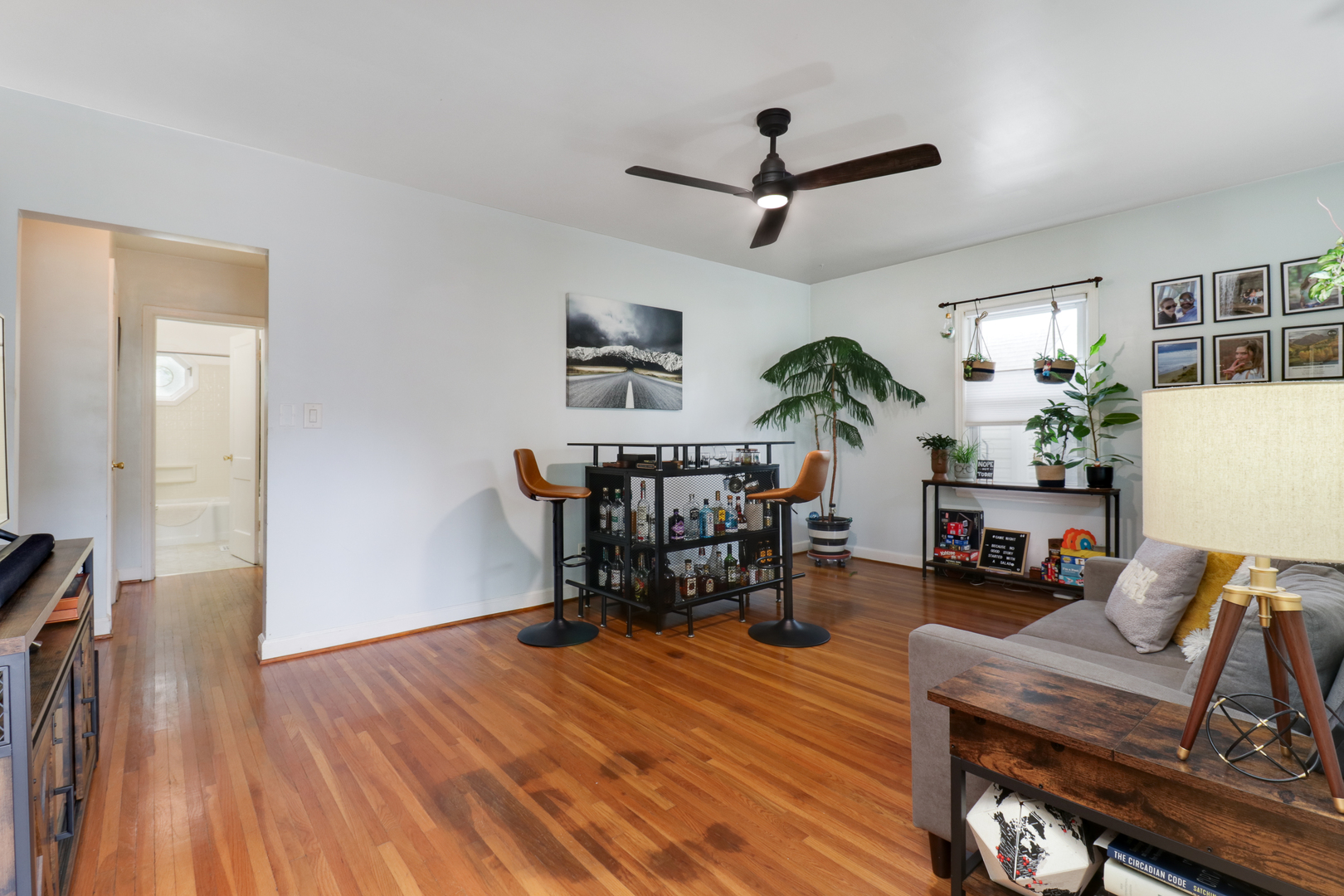 4 University Court Normal, IL 61761 - Photo 6 of 54 a living room with furniture and a wooden floor