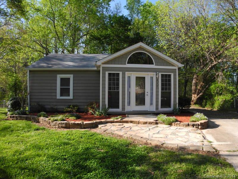 617 Blacksnake Road Stanley, NC 28164 - Photo 2 of 24 a front view of a house with yard and trees in the background