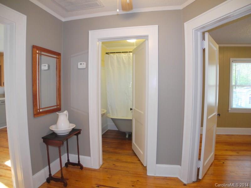 617 Blacksnake Road Stanley, NC 28164 - Photo 18 of 24 a view of a bathroom with tub shower bedroom and window