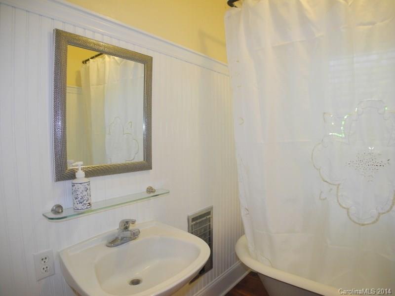 617 Blacksnake Road Stanley, NC 28164 - Photo 19 of 24 a bathroom with a sink and a mirror