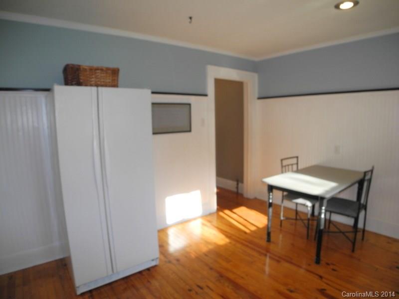 617 Blacksnake Road Stanley, NC 28164 - Photo 22 of 24 a view of a livingroom with furniture and wooden floor