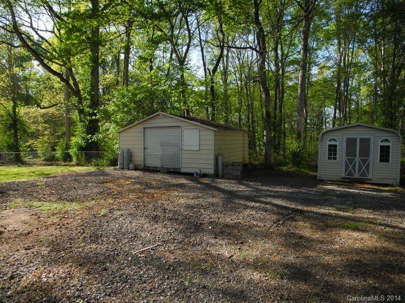 617 Blacksnake Road Stanley, NC 28164 - Photo 6 of 24 a view of a house with a yard