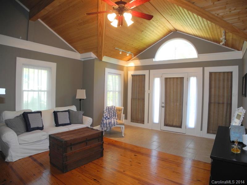 617 Blacksnake Road Stanley, NC 28164 - Photo 10 of 24 a living room with furniture and a large window