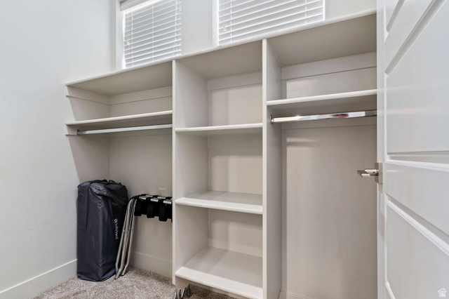 2600 Ocotillo Way, Unit 31 Santa Clara, UT 84765 - Photo 20 of 73 Custom closet system featuring multiple shelving units and hanging rods