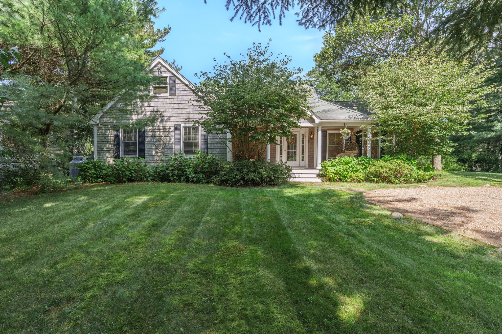 165 West Tisbury Road Edgartown, MA 02539 - Photo 3 of 29 a front view of house with yard and green space