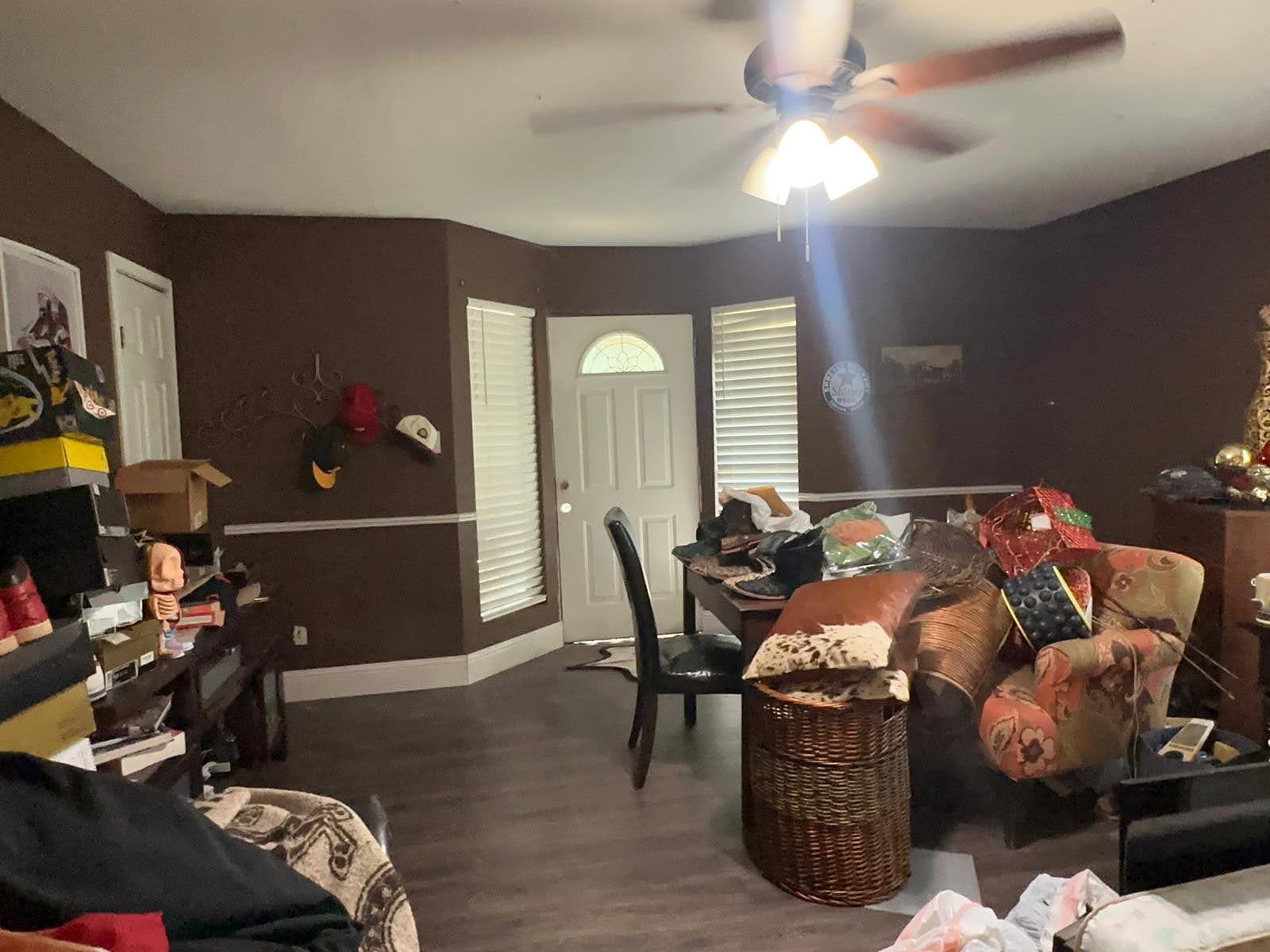 2629 Kowis Street Houston, TX 77093 - Photo 6 of 17 a living room with furniture a light fixture and a flat screen tv