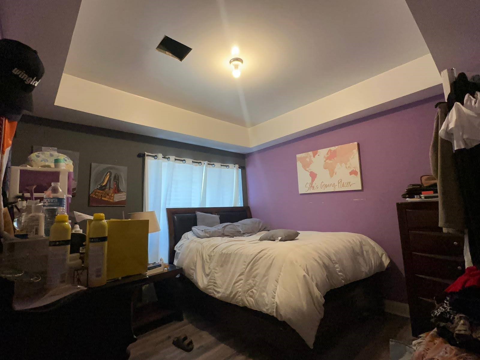 2629 Kowis Street Houston, TX 77093 - Photo 9 of 17 a bedroom with a bed and a closet