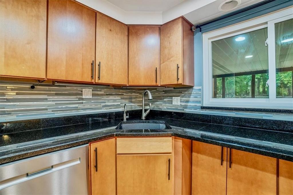 2341 Sample Road Allison Park, PA 15101 - Photo 12 of 50 a kitchen with stainless steel appliances sink and cabinets