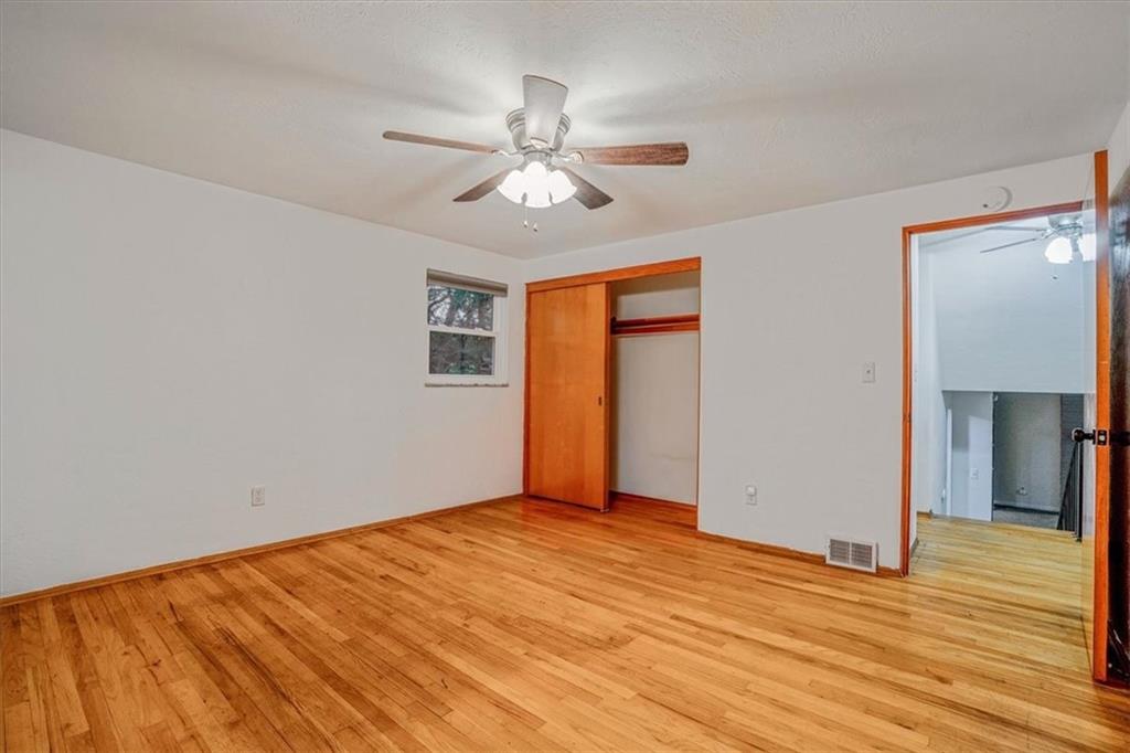 2341 Sample Road Allison Park, PA 15101 - Photo 24 of 50 a view of empty room with wooden floor and fan