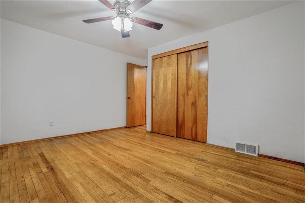 2341 Sample Road Allison Park, PA 15101 - Photo 25 of 50 a view of an empty room with wooden floor and a window