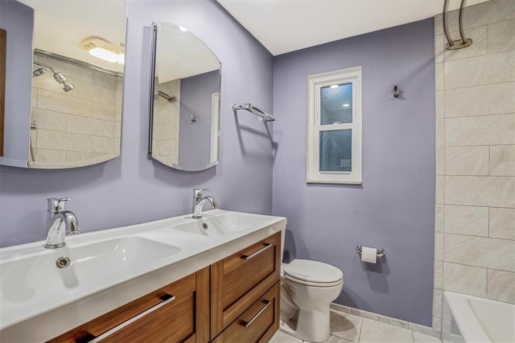 2341 Sample Road Allison Park, PA 15101 - Photo 26 of 50 a bathroom with a toilet sink and mirror