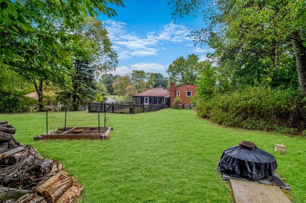 2341 Sample Road Allison Park, PA 15101 - Photo 38 of 50 a view of a backyard with a garden and entertaining space