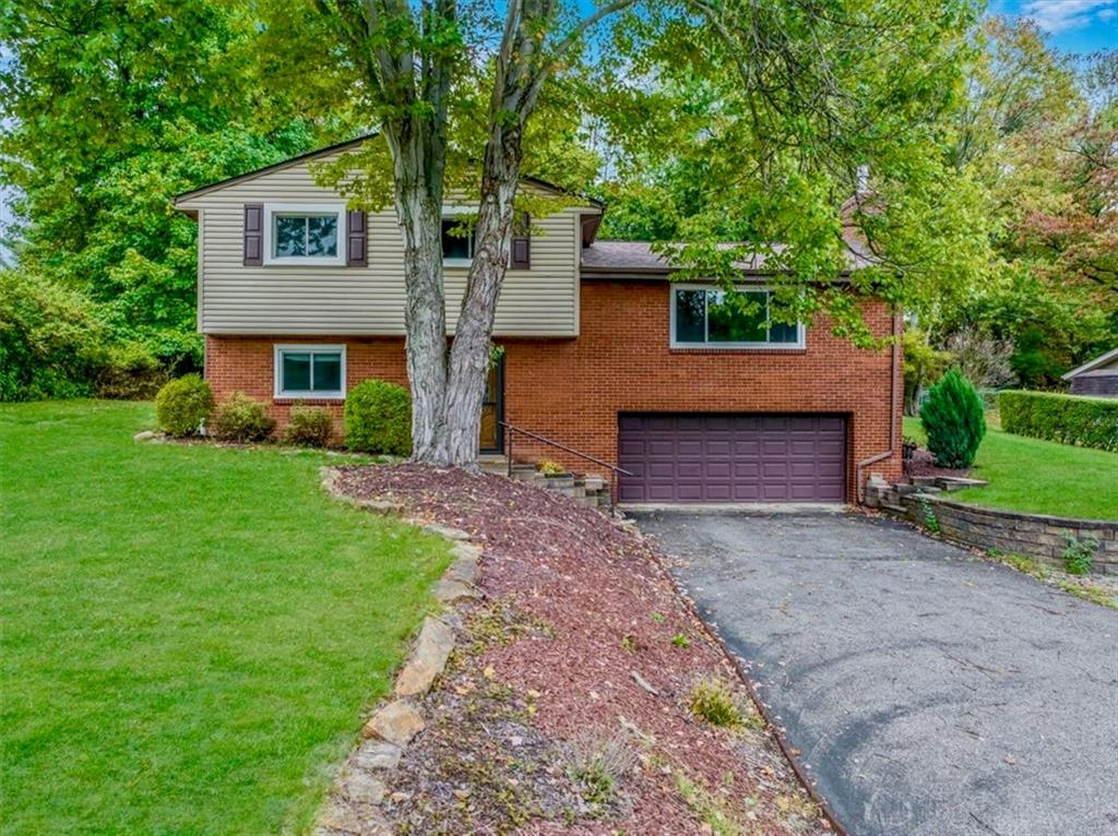 2341 Sample Road Allison Park, PA 15101 - Photo 42 of 50 a front view of a house with garden