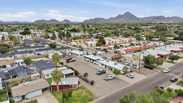 an aerial view of a city with lots of residential buildings