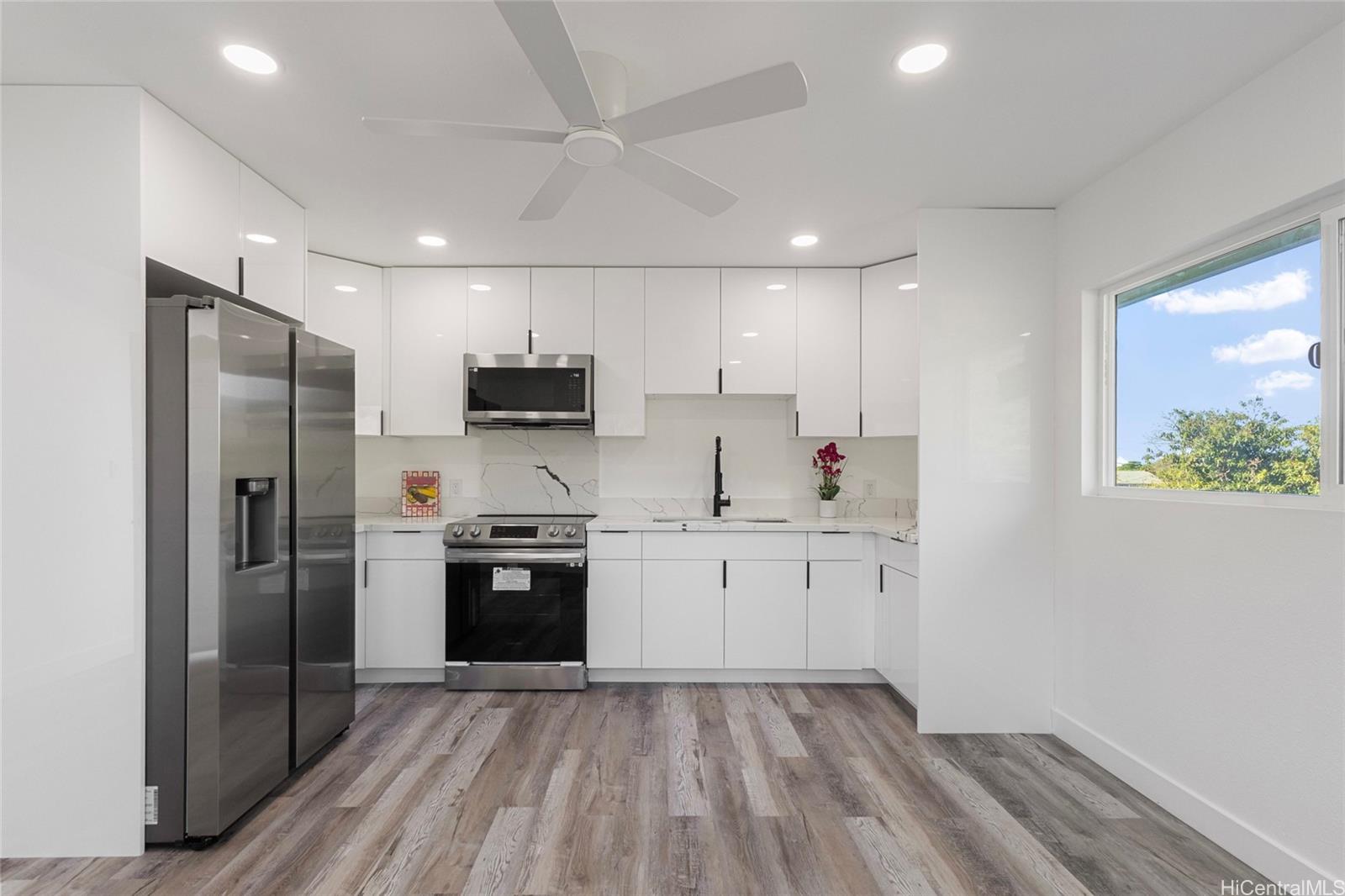 84-1036 Noholio Road Waianae, HI 96792 - Photo 12 of 25 upstairs kitchen with stainless steel appliances.