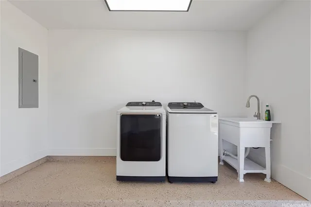 a utility room with dryer and washer