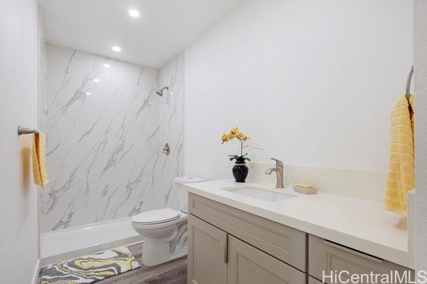 84-1036 Noholio Road Waianae, HI 96792 - Photo 5 of 25 downstairs primary bedroom en suite bathroom.