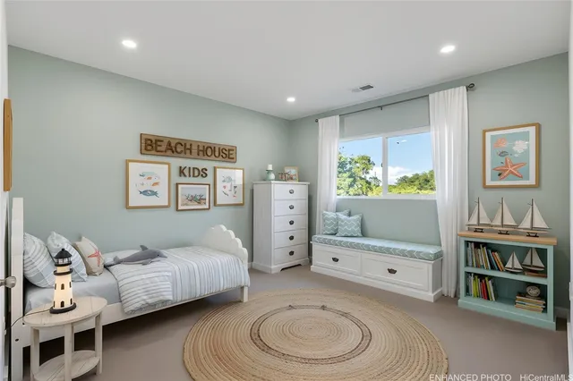 a spacious bedroom with a bed and a desk