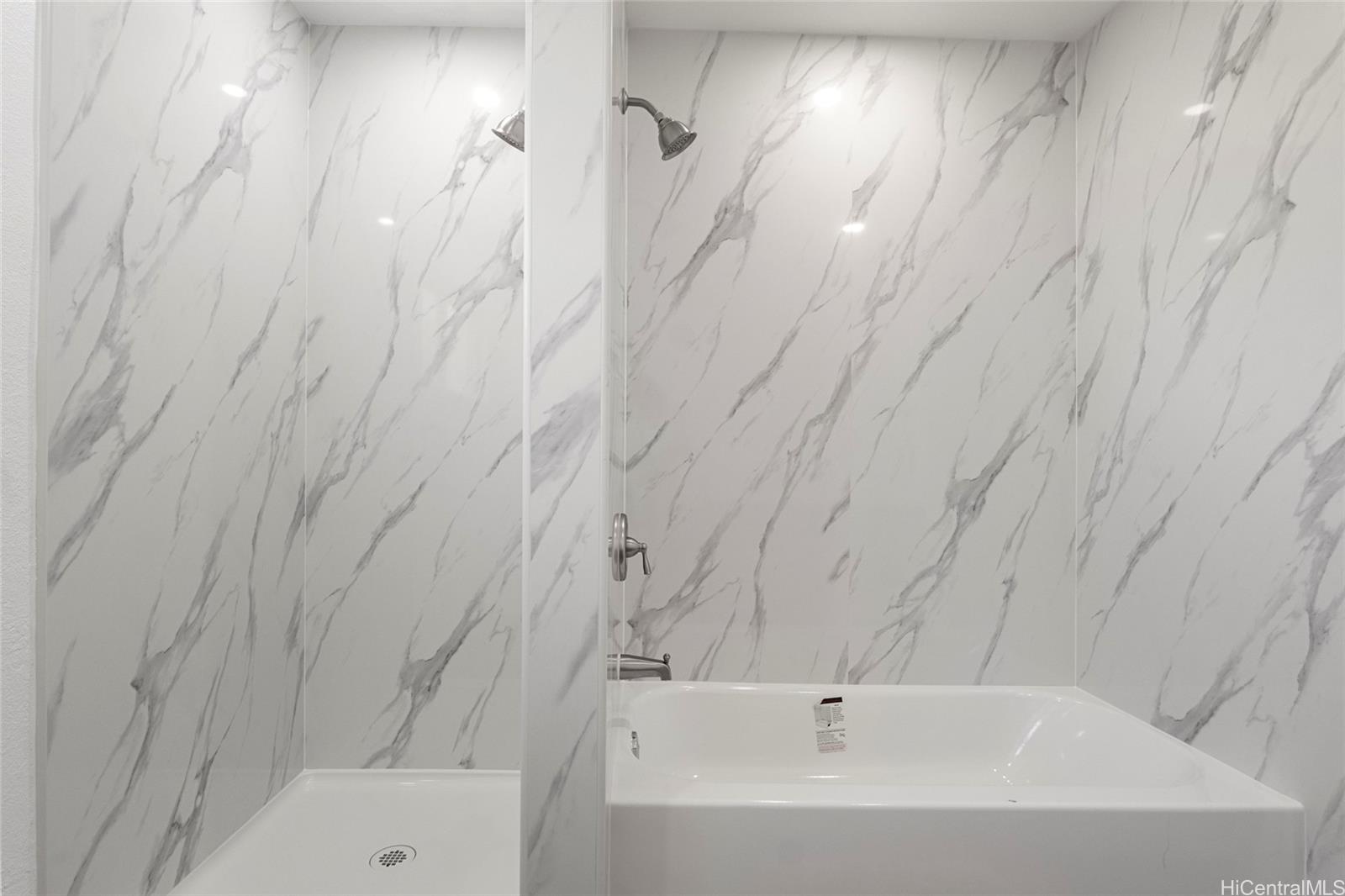 84-1036 Noholio Road Waianae, HI 96792 - Photo 8 of 25 tub AND shower in the hallway bathroom