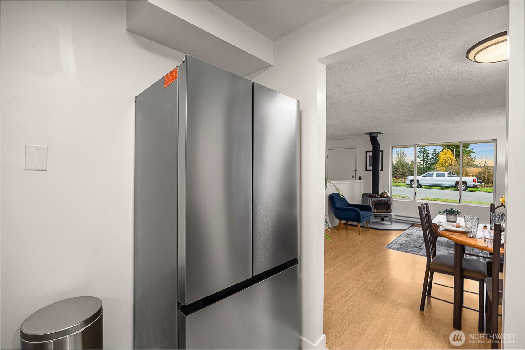 2108 Summit Avenue, Unit 3 Everett, WA 98201 - Photo 12 of 28 a view of living room filled with furniture and a flat screen tv
