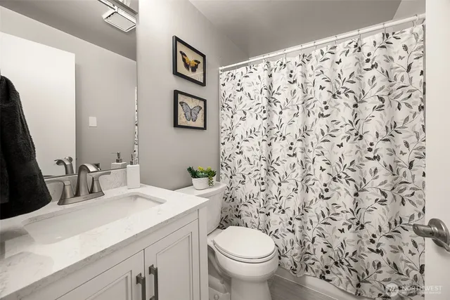 a bathroom with a sink and a toilet