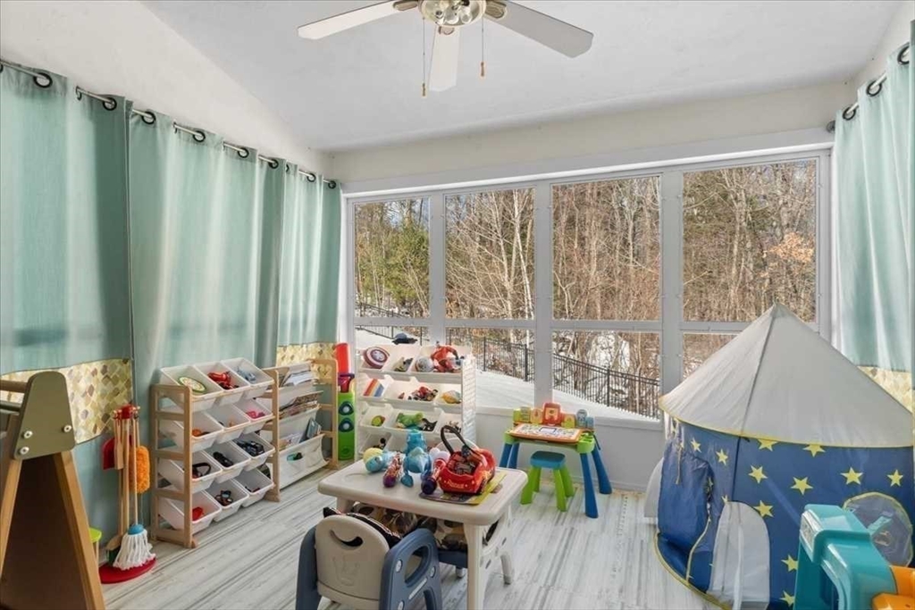 57 Partridge Hill Road Sutton, MA 01590 - Photo 14 of 40 a bedroom with furniture and a bed