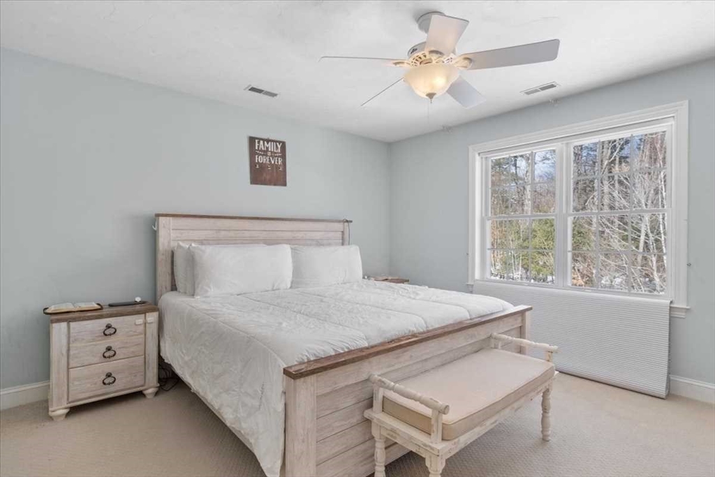 57 Partridge Hill Road Sutton, MA 01590 - Photo 15 of 40 a bedroom with a bed and a window
